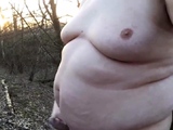 Chubby masturbates in the woods