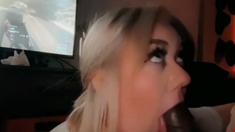 Blonde Babe Deepthroats a Big Cock While He Plays COD