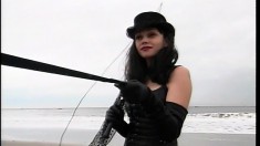 Demanding dominatrix suits up her slave and takes her for a walk