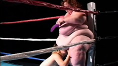 Chubby ladies play with a dildo and share a midget's cock in the ring