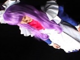 Japanese chick in costume and purple hair chews on his wanker